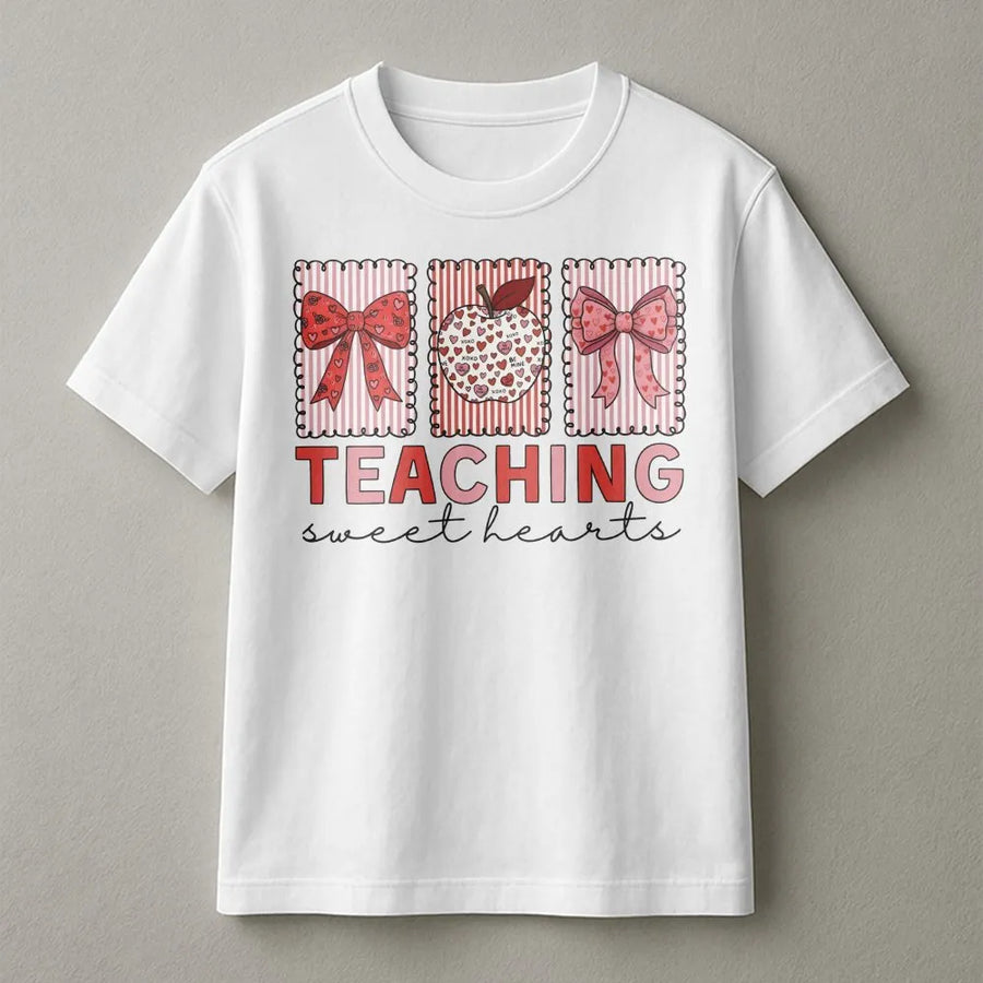 Teaching Sweet Hearts T-Shirt | Valentine Teacher Apple Bow Graphic | Premium Cotton Apparel | Cute Teacher Appreciation Valentine's Day Gift
