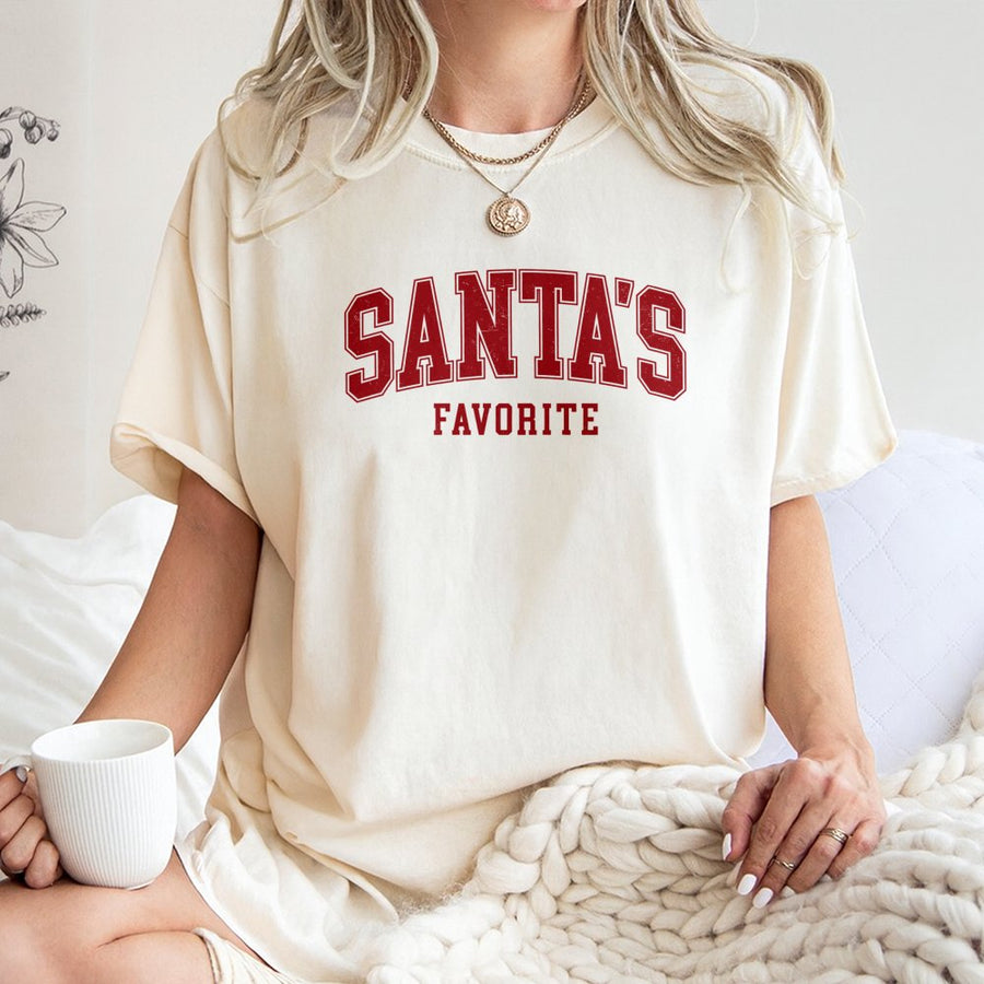Santa's Favorite T-Shirt | Varsity Lettering Christmas Graphic | Premium 100% Cotton | Cute Festive Holiday Gift for Family