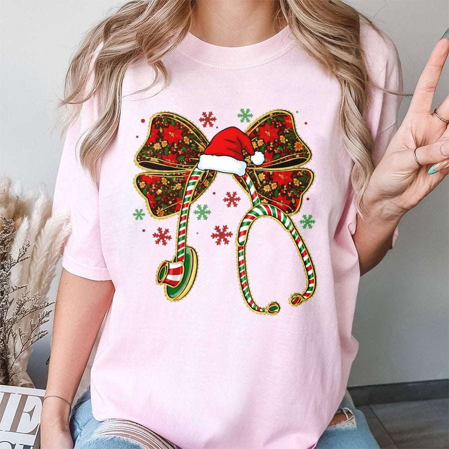 Christmas Nurse T-Shirt | Coquette Bow Stethoscope Design | Premium 100% Cotton | Cute Holiday Gift for Nurses & Healthcare Workers