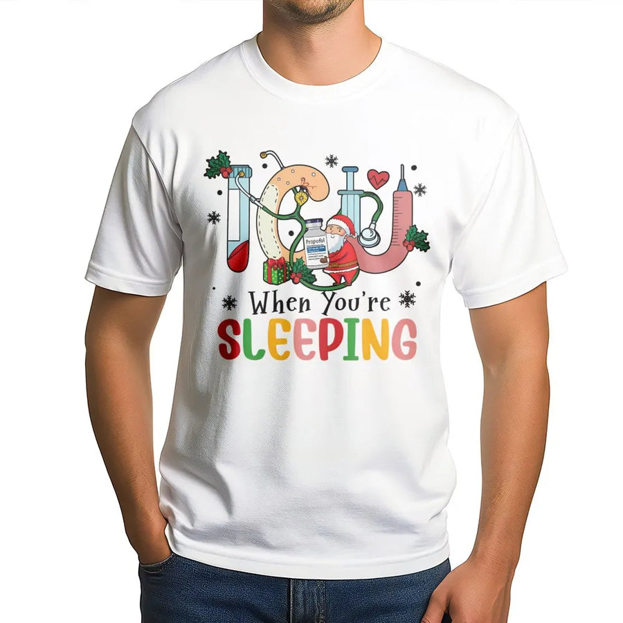 ICU Nurse Christmas T-Shirt | Funny When You're Sleeping Santa Medical Design | Premium Cotton Graphic Tee | Gift for Intensive Care Unit RNs