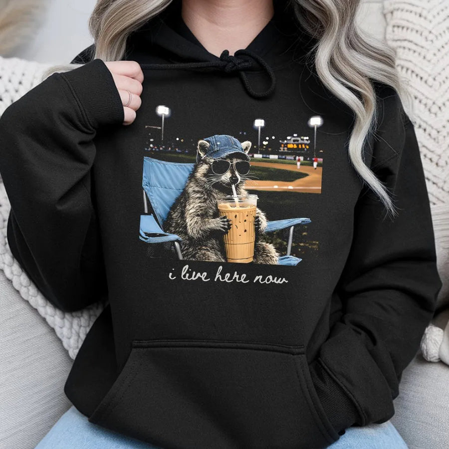 Raccoon Baseball Hoodie | Funny I Live Here Now Graphic | Premium Cotton Blend | Baseball Mom Gift for Softball Tournament Enthusiasts