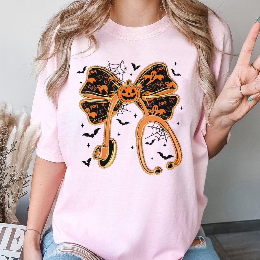 Halloween Nurse T-Shirt | Pumpkin Bow Stethoscope Graphic | Premium Soft Cotton | Spooky Gift for RNs and Healthcare Workers