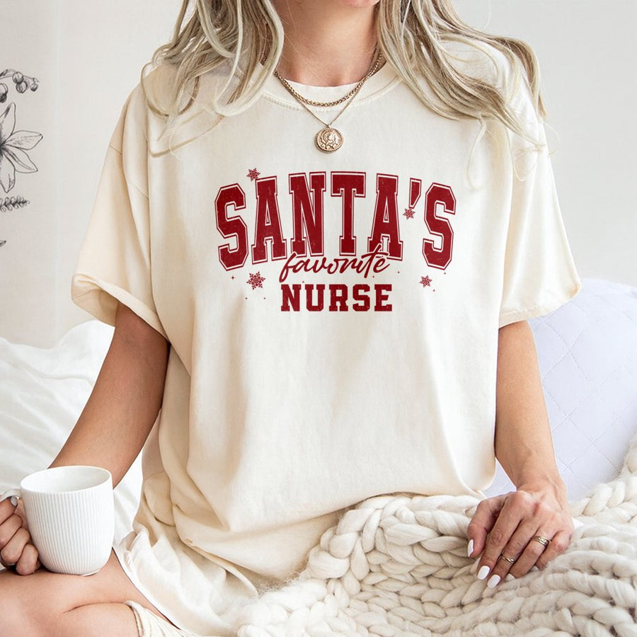 Santa's Favorite Nurse T-Shirt | Distressed Snowflake Graphic Holiday Design | 100% Cotton Premium Tee | Cute Christmas Gift for RN LPN CNA Nurses