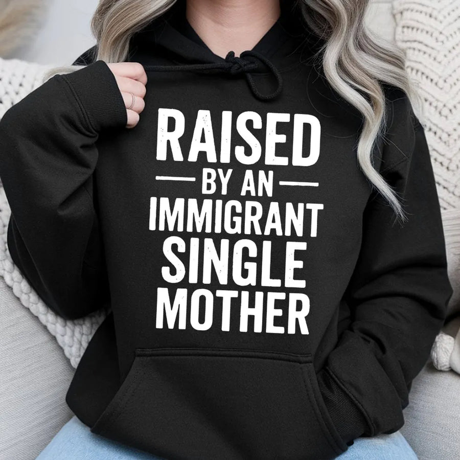 Raised By An Immigrant Single Mother Hoodie | Empowering Quote Graphic Pullover | Premium Cotton Blend | Meaningful Gift For First Generation Kids