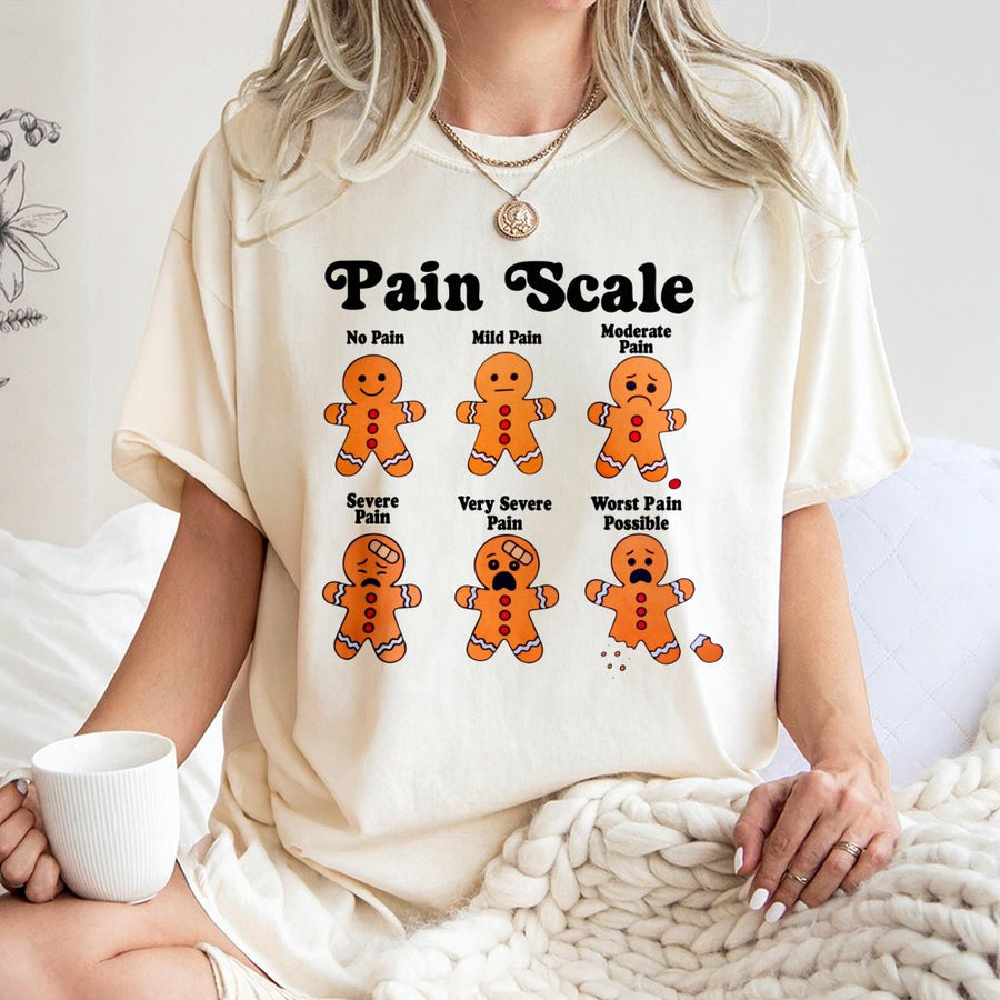 Gingerbread Man Pain Scale T-Shirt | Funny Christmas Nurse Gift | 100% Cotton Premium Tee | Holiday Apparel For Nurses & Medical Students