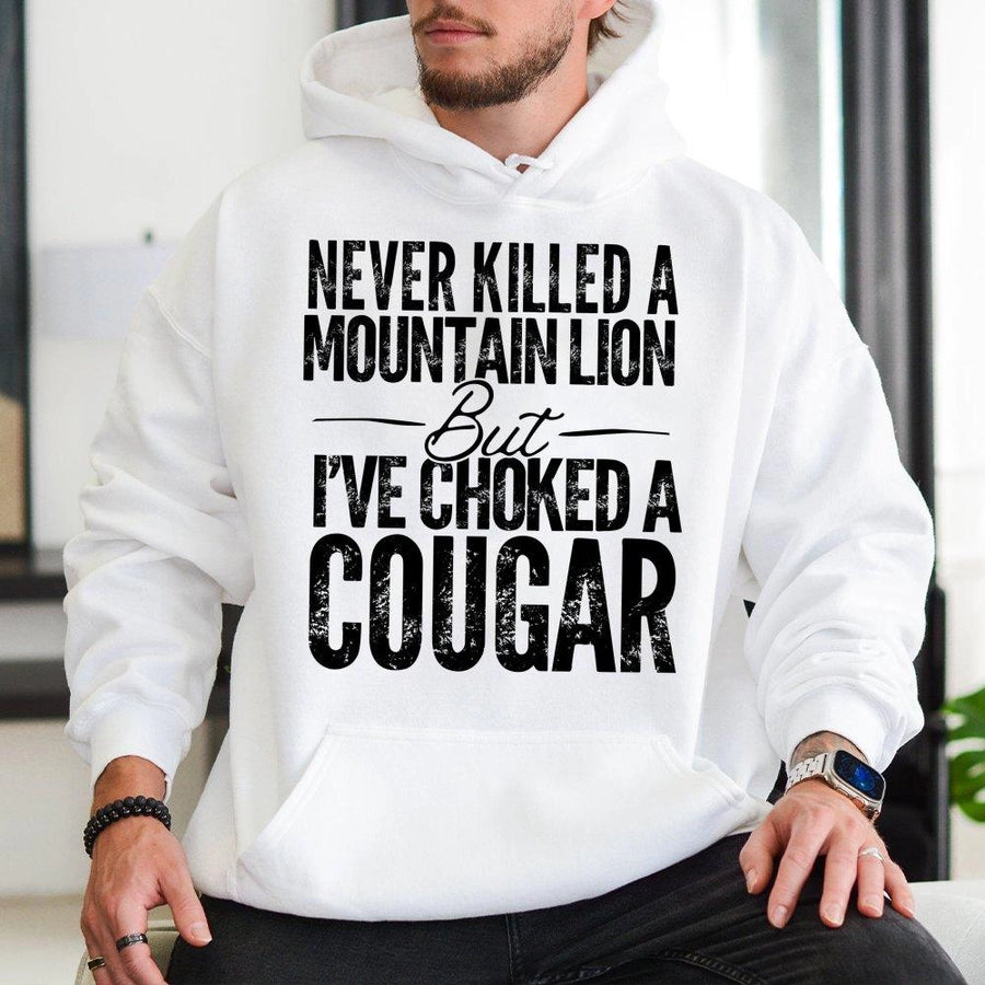 Funny Cougar Hoodie | Never Killed A Mountain Lion Sarcastic Quote | Premium Cotton-Poly Blend | Edgy Gift For Men And Women
