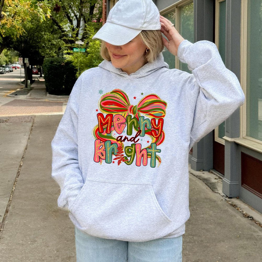 Merry and Bright Hoodie | Coquette Christmas Bow Graphic | Soft Cotton-Polyester Blend | Trendy Holiday Gift for Women and Girls
