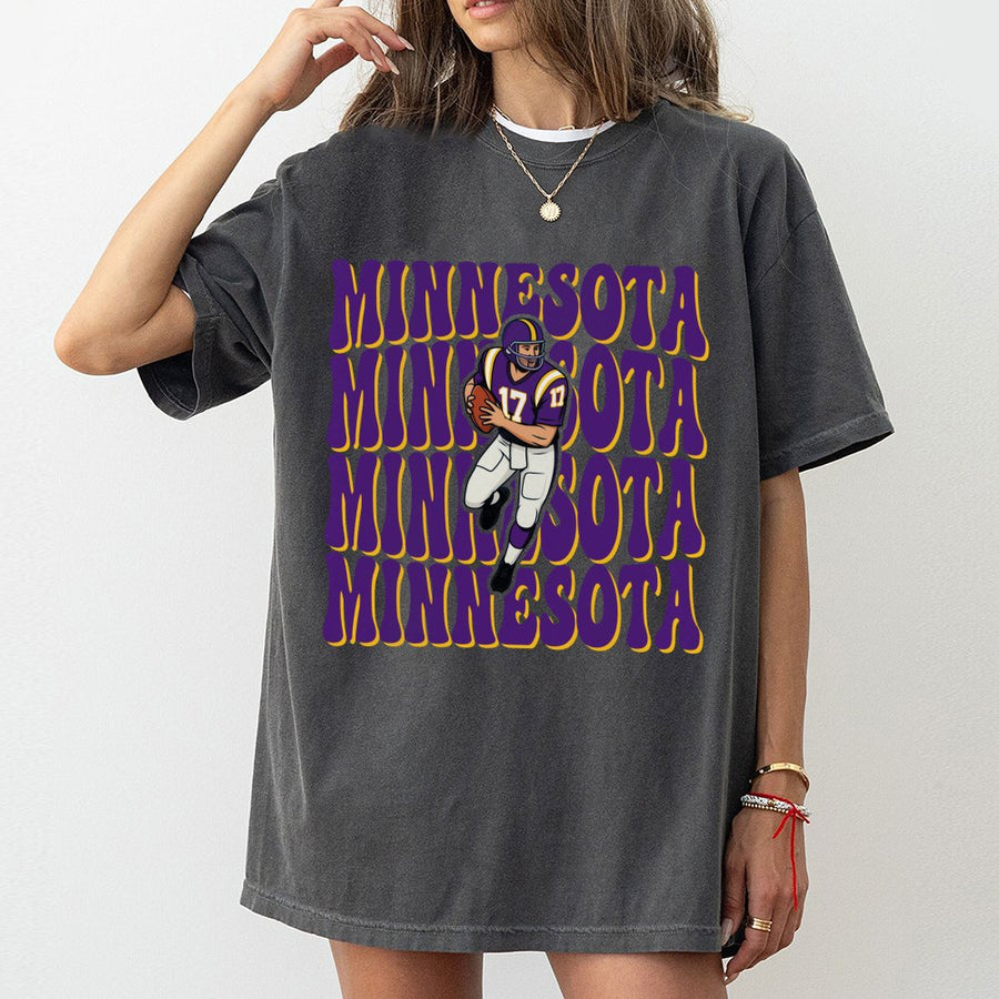 Minnesota Repeating Retro Text With A Minnesota Vikings Football Player Graphic T-Shirt