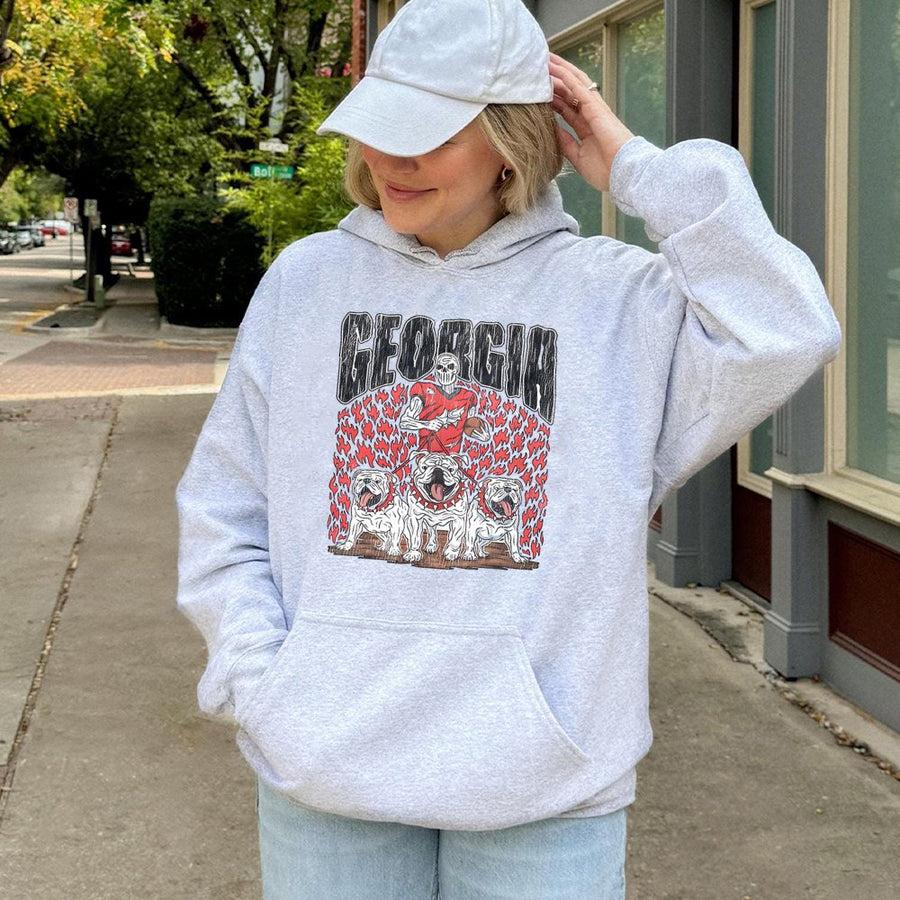 Georgia With A Skeletal Football Player Holding A Football, Three Bulldogs, And Flames Hoodie