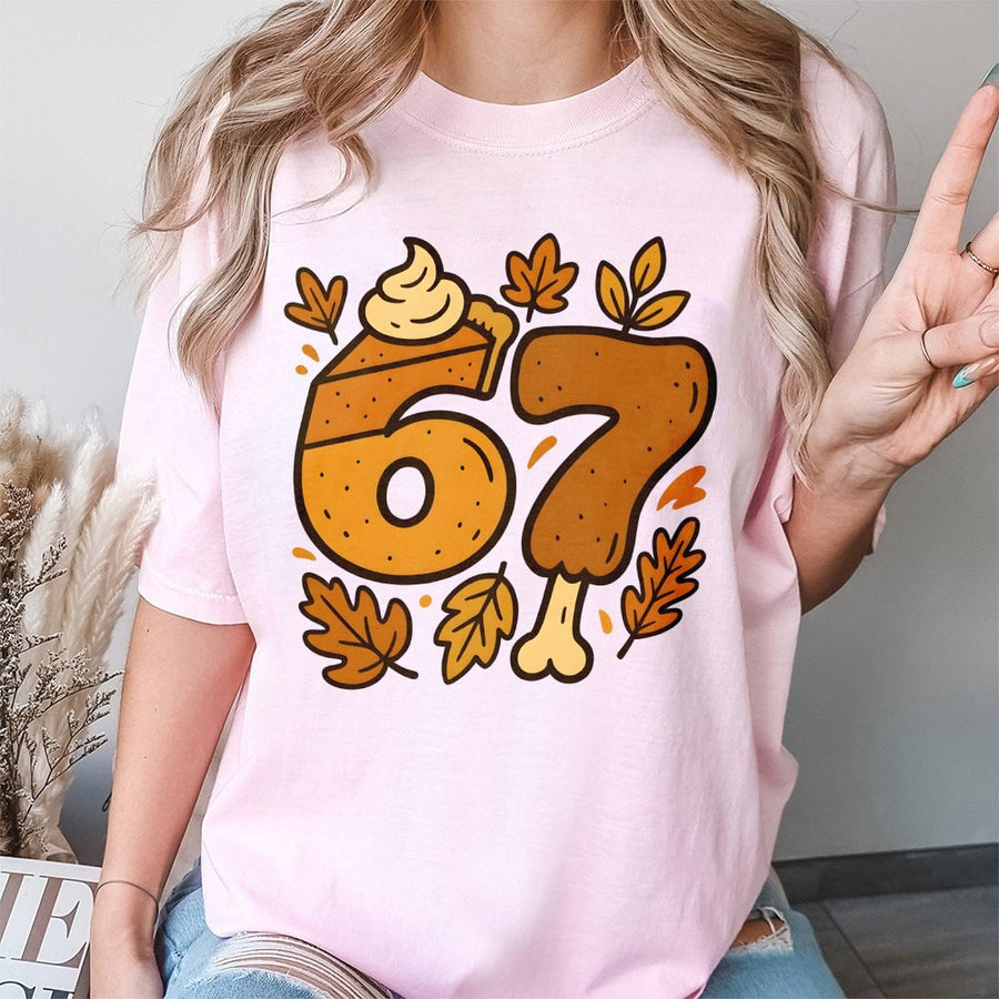 67 Birthday T-Shirt | Thanksgiving Pumpkin Pie and Turkey Graphic | Premium 100% Cotton Tee | Funny Fall Themed Birthday Gift for Him or Her