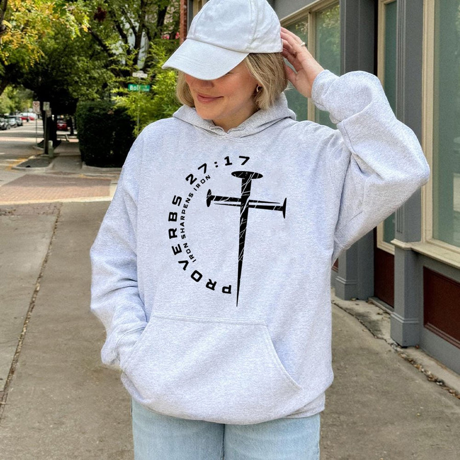 Proverbs 27:17 Hoodie | Iron Sharpens Iron Cross Nail Design | Premium Cotton Blend Apparel | Faith-Based Christian Gift for Men and Women