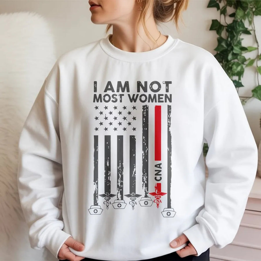CNA Sweatshirt | I Am Not Most Women Flag Design | Premium Nursing Assistant Crewneck | Gift For CNA Graduation And Nursing Appreciation