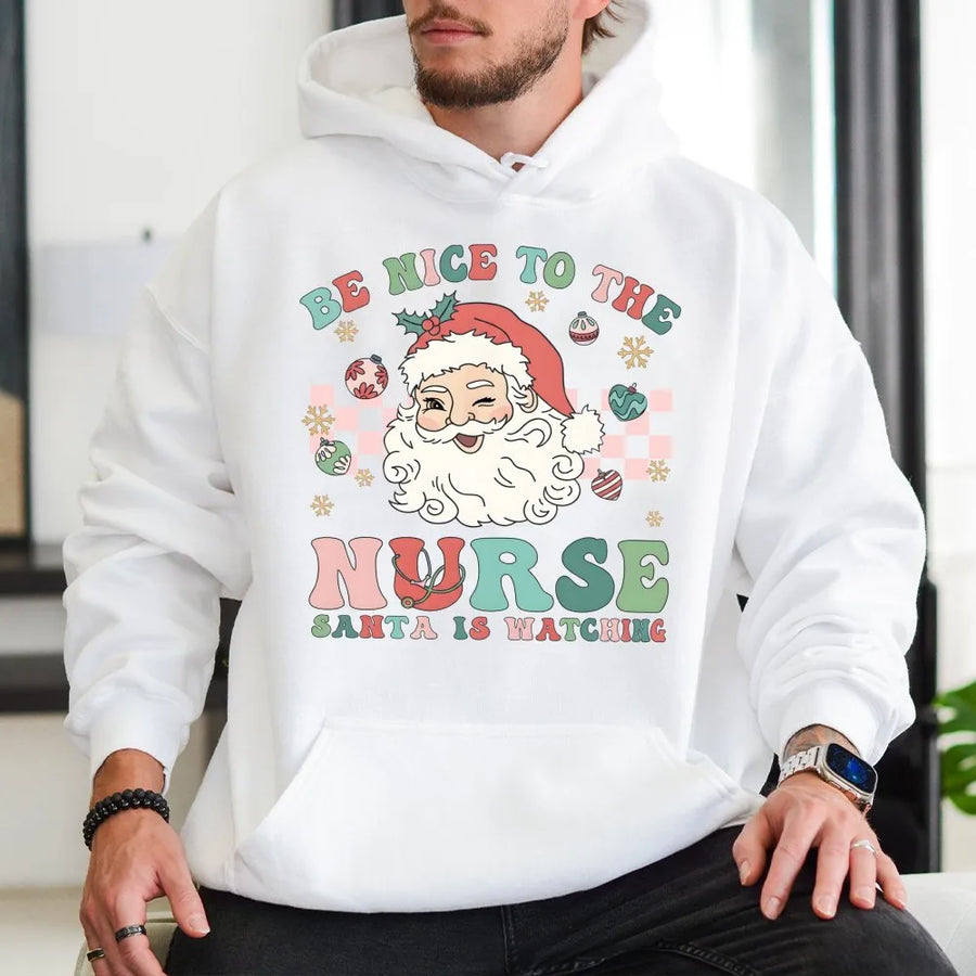 Nurse Christmas Hoodie | Be Nice To The Nurse Santa Is Watching Retro Design | Premium Cotton Blend | Funny Holiday Gift For RNs And Nursing Students