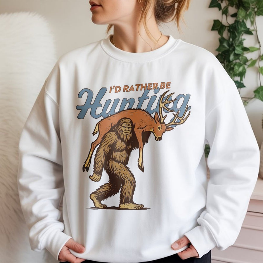 Bigfoot Hunting Sweatshirt | Funny Sasquatch Carrying Deer Graphic | Premium Cotton Blend Unisex Crewneck | Unique Hunter Gift for Outdoorsmen