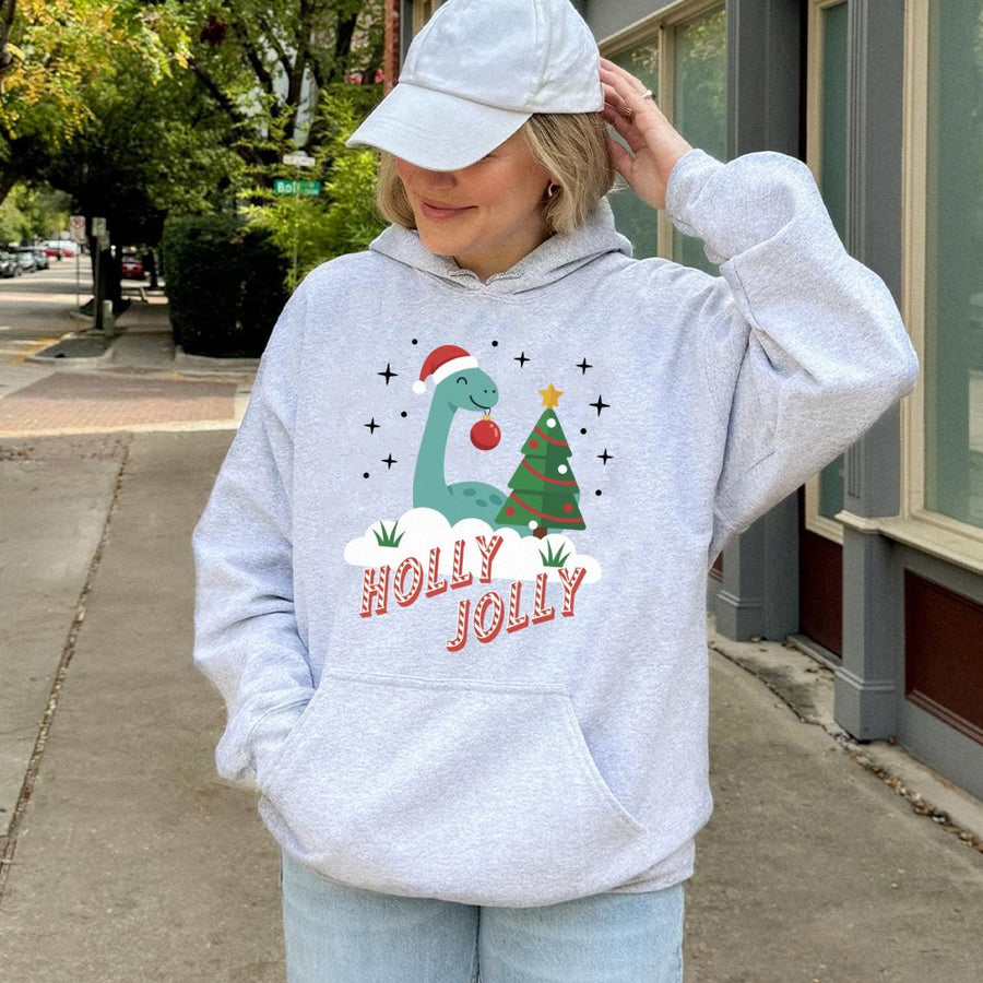 Holly Jolly Dinosaur Christmas Hoodie | Cute Dino Graphic Sweater | Premium Cotton-Blend Apparel | Festive Gift for Kids and Adults