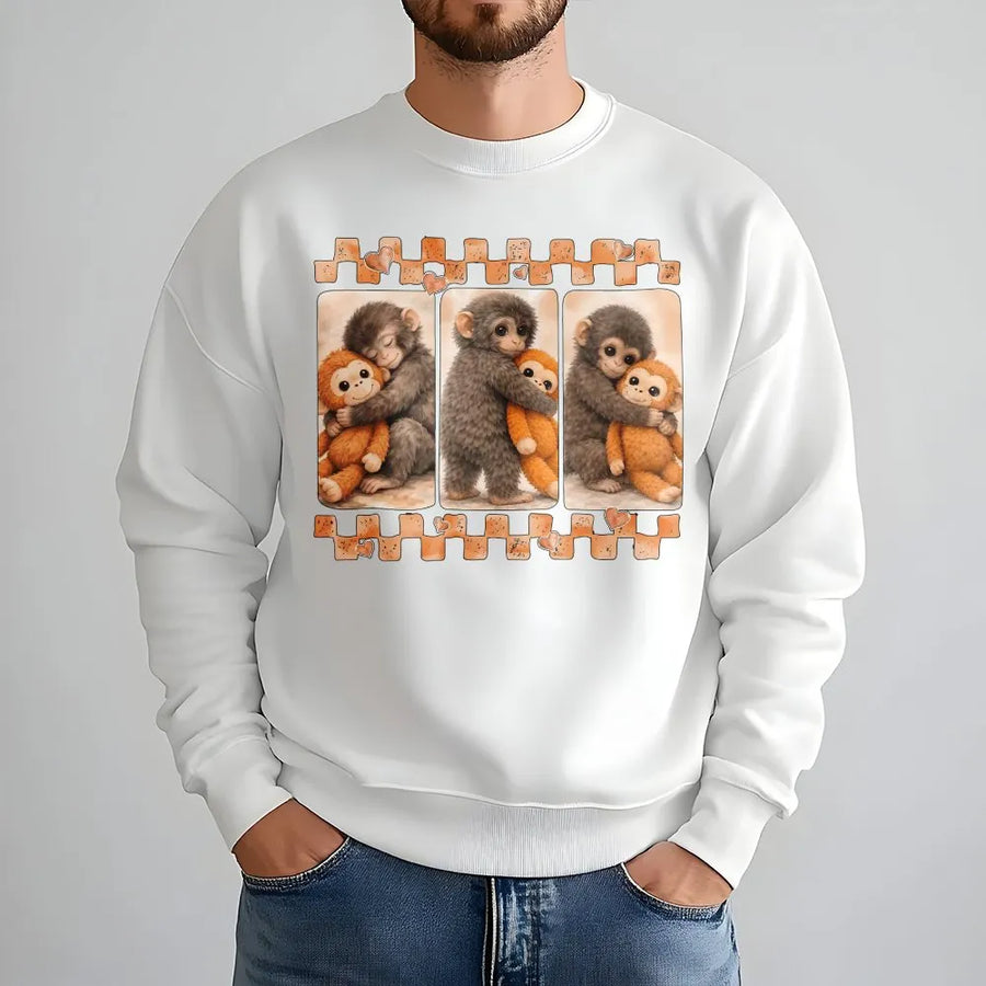 Cute Monkey Hugging Plush Toy Sweatshirt | Emotional Viral Animal Graphic | Premium Cotton Blend Crewneck | Gift For Monkey Lovers And Teens