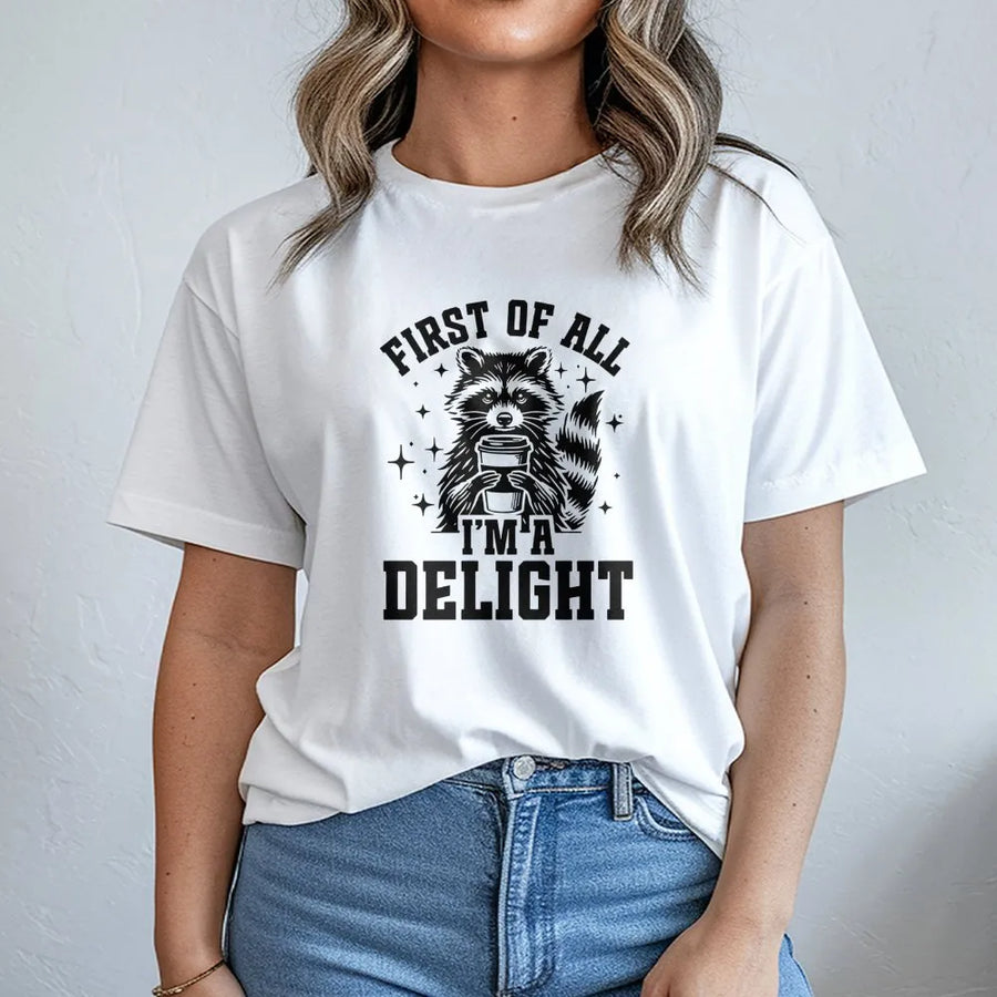 Raccoon Coffee T-Shirt | First Of All I'm A Delight Graphic Tee | Premium 100% Cotton Animal Shirt | Funny Wildlife Gift For Raccoon Lovers