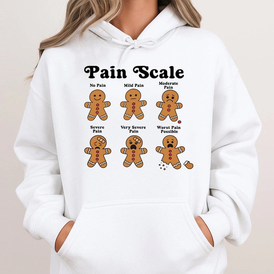 Funny Gingerbread Pain Scale Hoodie | Cute Nurse Christmas Graphic Sweatshirt | Premium Cotton-Poly Blend | Holiday Gift For Nurses & Medical Staff
