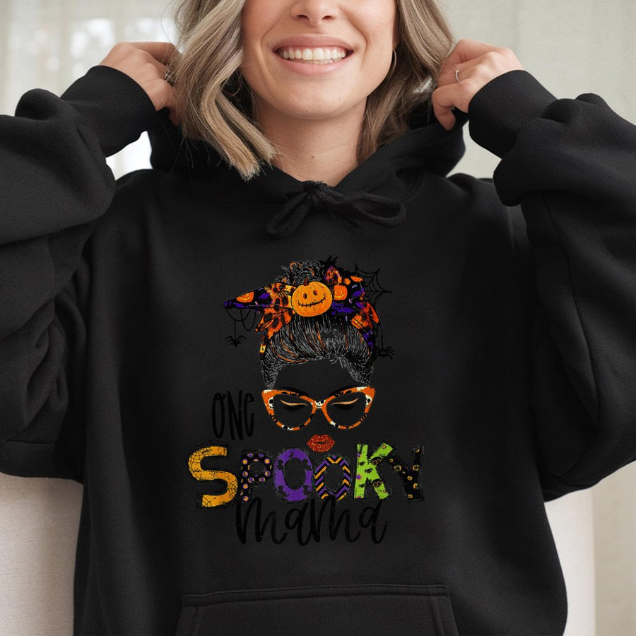 One Spooky Mama Hoodie | Cute Halloween Pumpkin Messy Bun Graphic | Soft Cotton-Polyester Premium Blend | Fall Outfit Gift for Mom