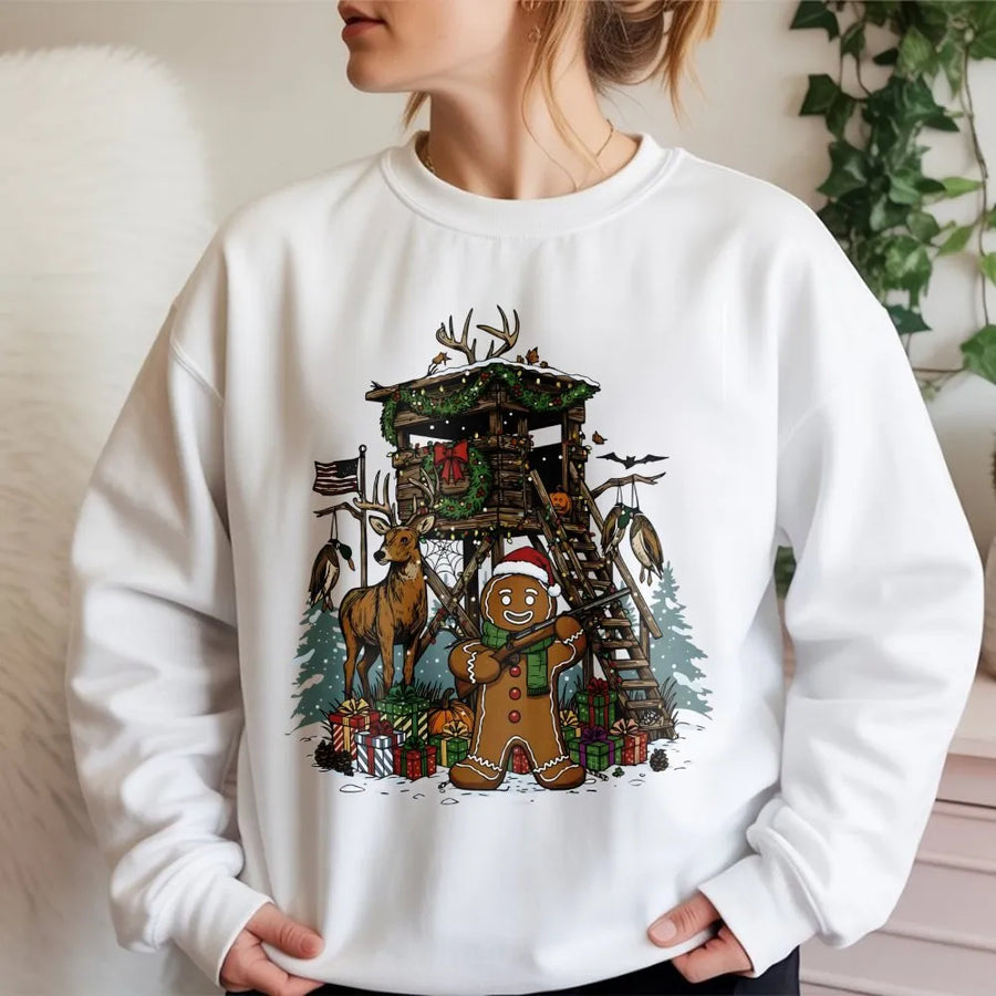 Gingerbread Man Hunting Sweatshirt | Funny Deer Hunter Christmas Cabin Scene | Premium Cotton Blend | Unisex Holiday Gift for Outdoor Enthusiast
