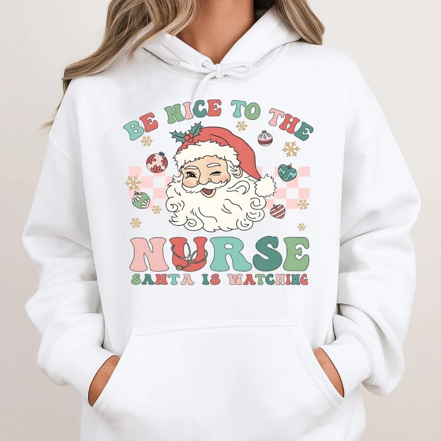 Nurse Christmas Hoodie | Be Nice To The Nurse Santa Is Watching Retro Design | Premium Cotton Blend | Funny Holiday Gift For RNs And Nursing Students