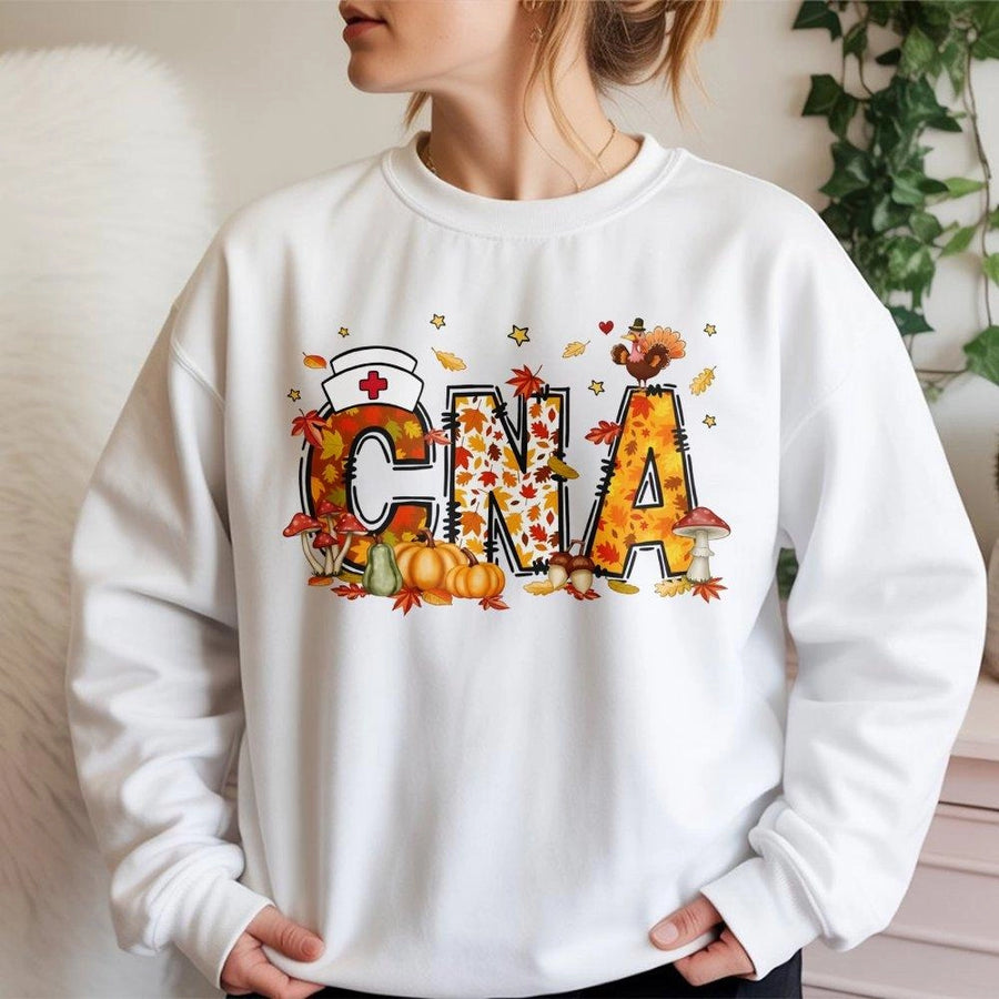 CNA Fall Sweatshirt | Thanksgiving Autumn Pumpkin Nurse Design | Premium Cotton Polyester Blend | Cute Gift for Nursing Assistants and CNAs
