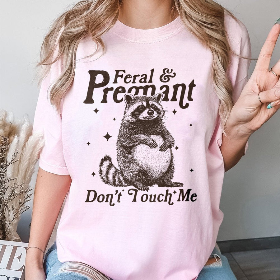 Feral and Pregnant Raccoon T-Shirt | Funny Maternity Graphic Tee | Premium 100% Cotton | Humorous Gift for First Time Moms and Expecting Women