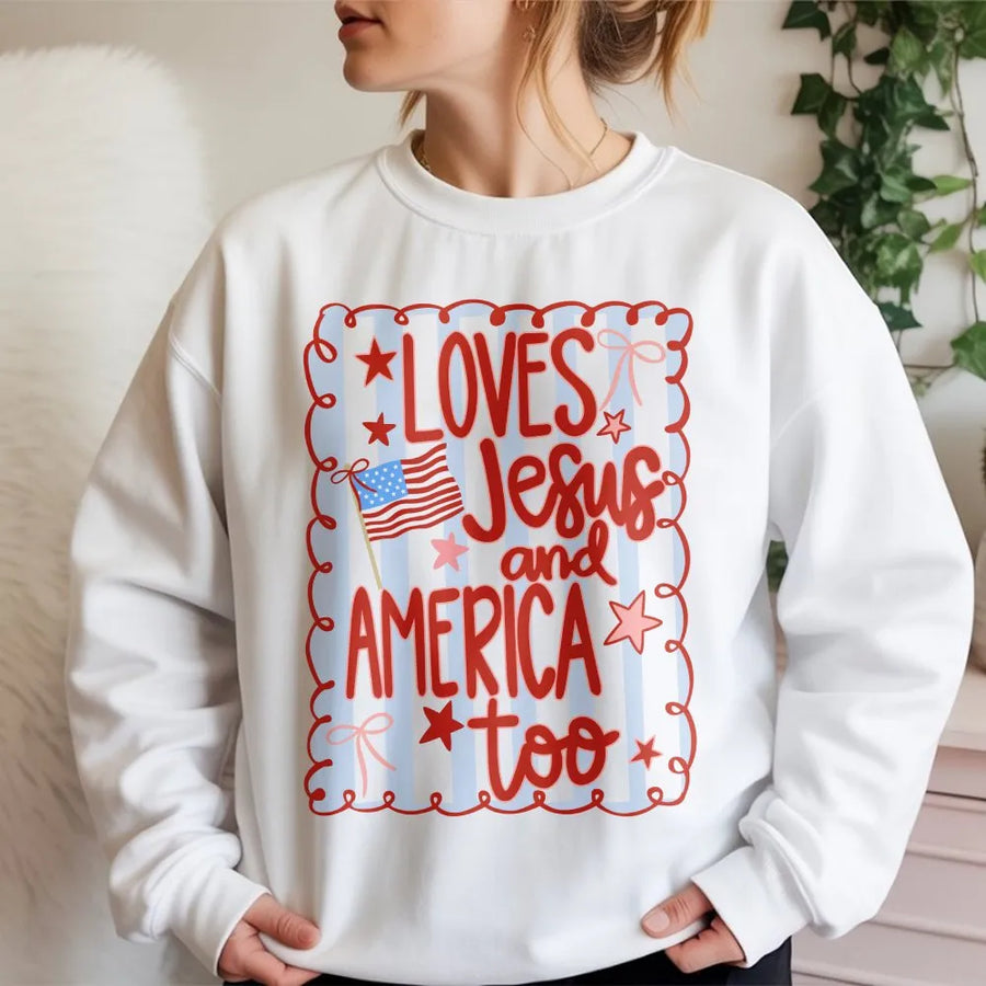 Loves Jesus and America Too Sweatshirt | Patriotic Coquette Bow Graphic | Premium Unisex Pullover | 4th of July Christian Gift for Her