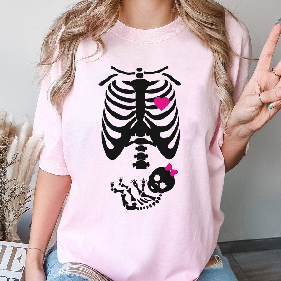 Funny Pregnant Skeleton T-Shirt | Cute Baby Girl Skeleton Reveal Graphic | Premium Soft Cotton Tee | Maternity Halloween Gift For Expecting Mom