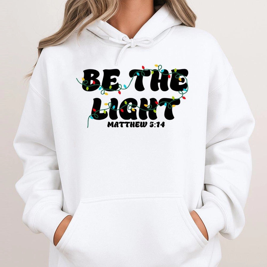 Be The Light Christian Hoodie | Matthew 5:14 Christmas Lights Graphic | Cotton-Poly Blend Premium Comfort | Faith-Based Holiday Gift for Believers
