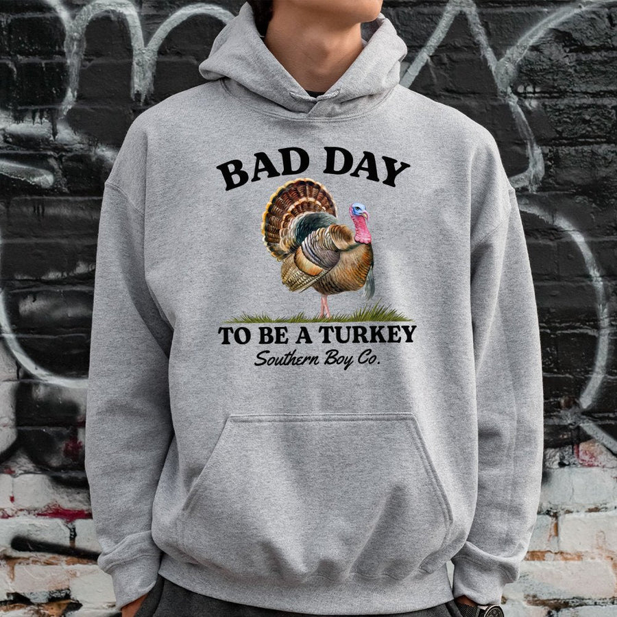 Bad Day To Be A Turkey Hoodie | Funny Thanksgiving Graphic Sweatshirt | Premium Cotton-Blend | Unisex Holiday Gift for Men and Women