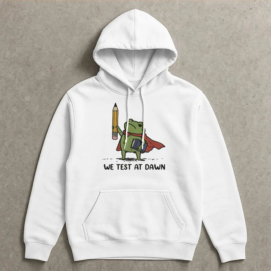 Funny Teacher Hoodie | We Test at Dawn Superhero Frog Graphic | Soft Cotton Blend Pullover | Gift for Educators and Professors