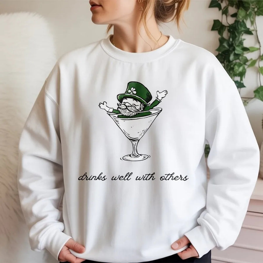 St. Patrick's Day Sweatshirt | Drinks Well With Others Leprechaun Martini | Premium Unisex Holiday Crewneck | Funny Irish Drinking Gift