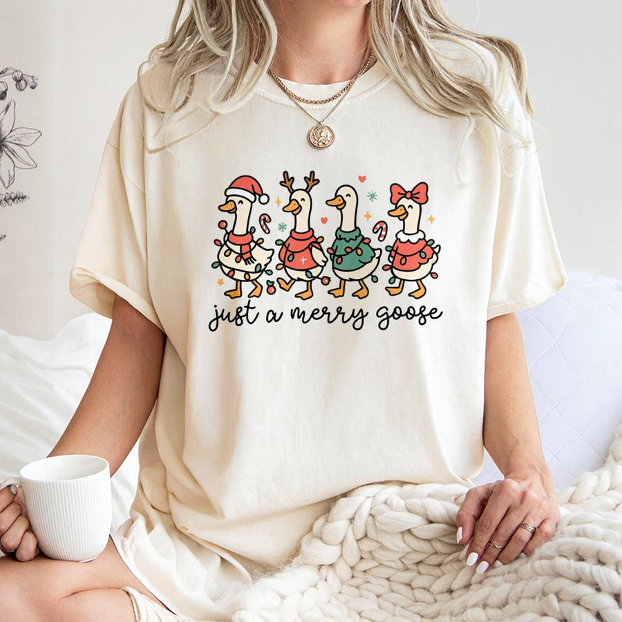 Christmas Goose T-Shirt | Funny Holiday Bird Graphic with Santa Hat and Lights | 100% Soft Cotton Premium Tee | Festive Gift for Goose Lovers