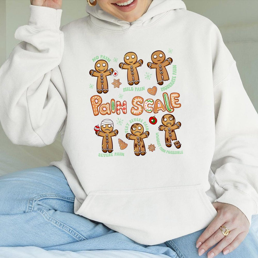 Funny Pain Scale Hoodie | Gingerbread Man Christmas Graphic | Premium Cotton Blend | Gift for Nurses and Medical Professionals