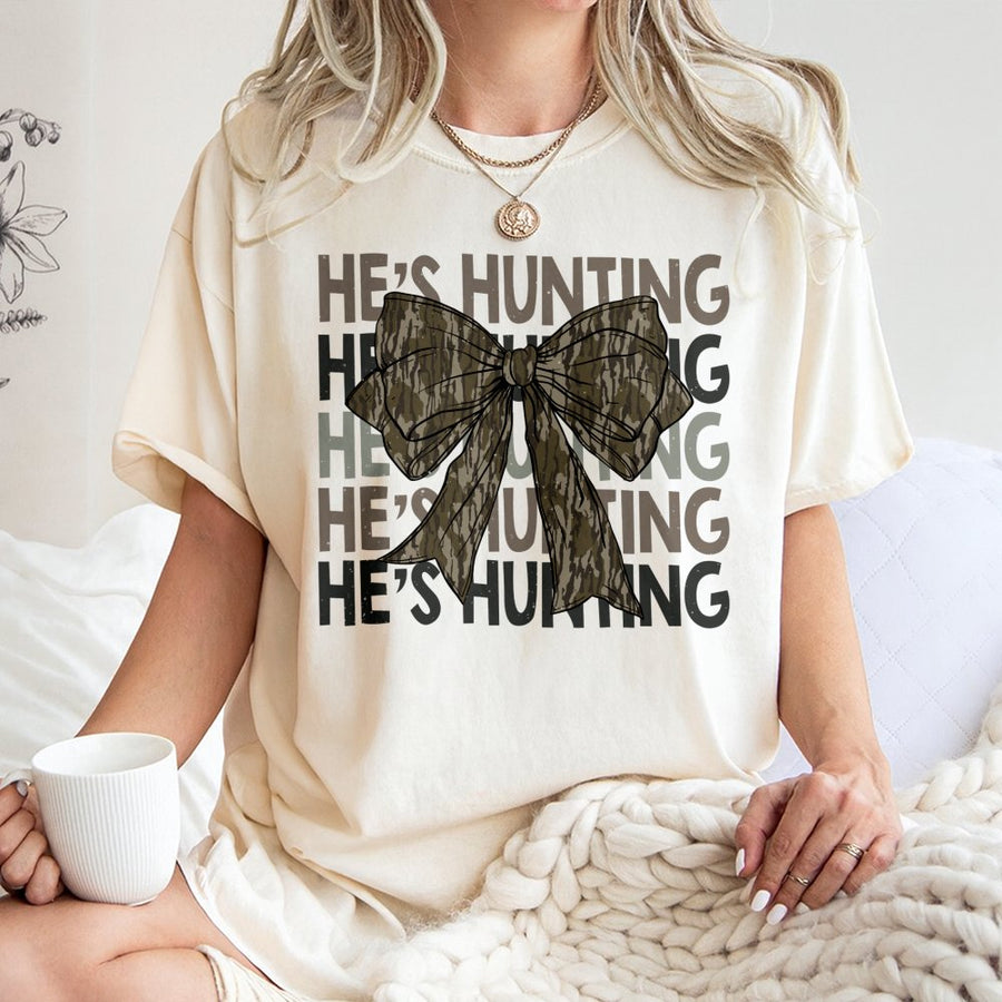 He's Hunting Camo Bow T-Shirt | Coquette Aesthetic Hunting Season Tee | Premium Soft Cotton | Funny Country Girl Gift For Her