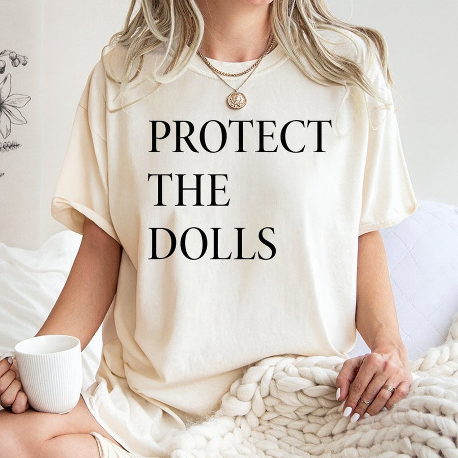 Protect The Dolls T-Shirt | Minimalist Social Justice Graphic Tee | Premium 100% Cotton | Inclusive LGBTQ Activist Gift for Equality