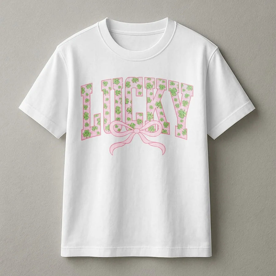 Lucky St. Patrick's Day T-Shirt | Pink Varsity Letter Shamrock Graphic With Bow | 100% Cotton Premium Tee | Cute Irish Clover Gift For Her