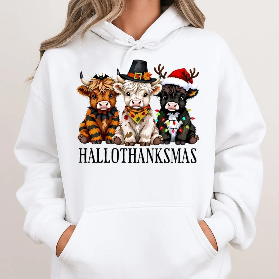 Highland Cow Hallothanksmas Hoodie | Cute Triple Holiday Graphic Design | Premium Cotton Blend | Funny Farm Animal Fall & Christmas Gift For Her