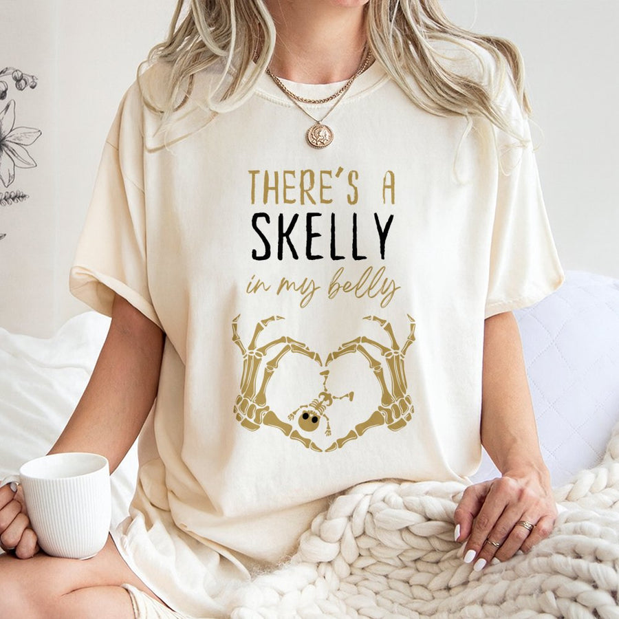 There's A Skelly In My Belly T-Shirt | Halloween Pregnancy Announcement | Soft Cotton Graphic Tee | Spooky Mom Gift For Expecting Parents