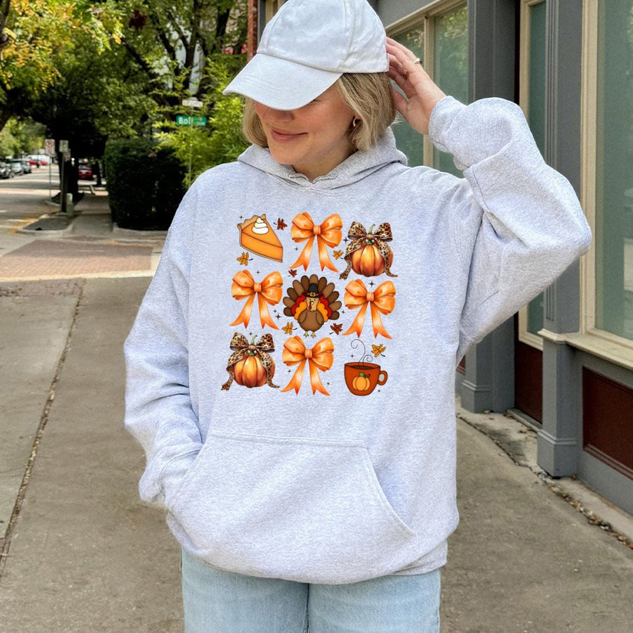 Coquette Thanksgiving Hoodie | Cute Turkey and Bow Graphic | Soft Cotton-Polyester Blend | Cozy Autumn Gift for Women