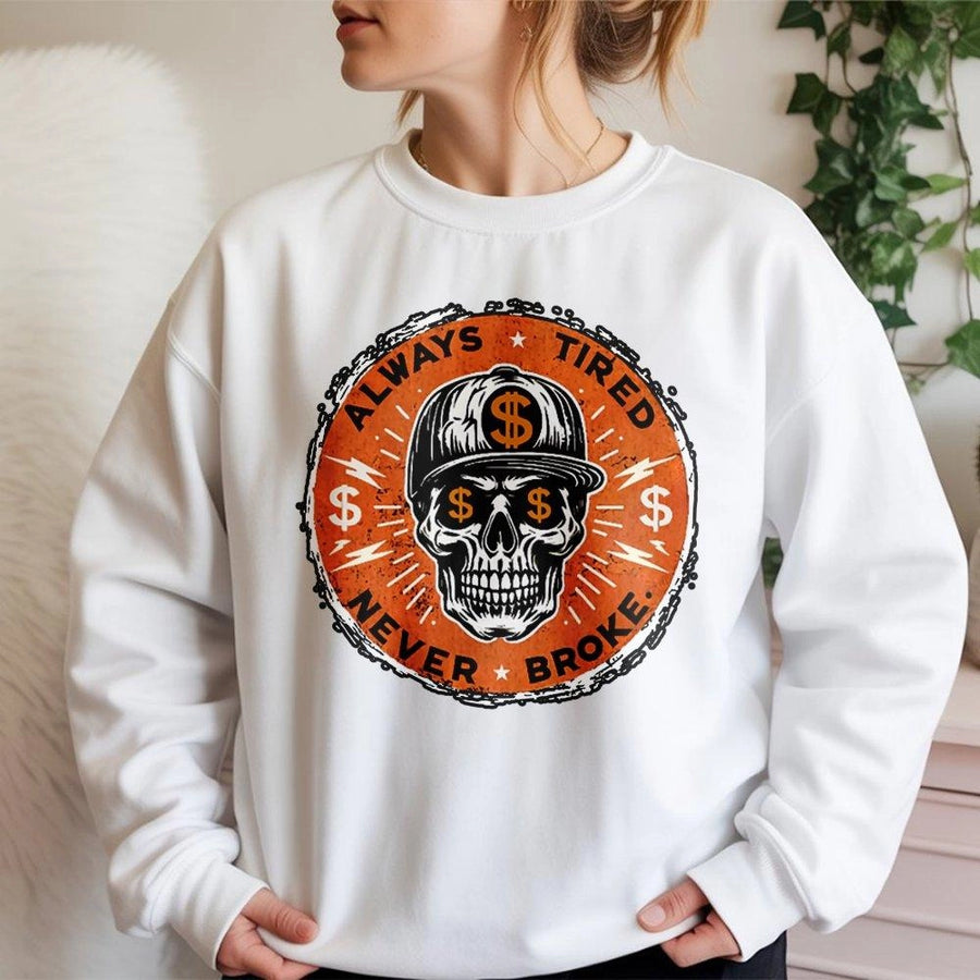 Always Tired Never Broke Sweatshirt | Hustle Culture Skull Graphic Print | Premium Cotton Blend Crewneck | Motivational Entrepreneur Gift for Men Women