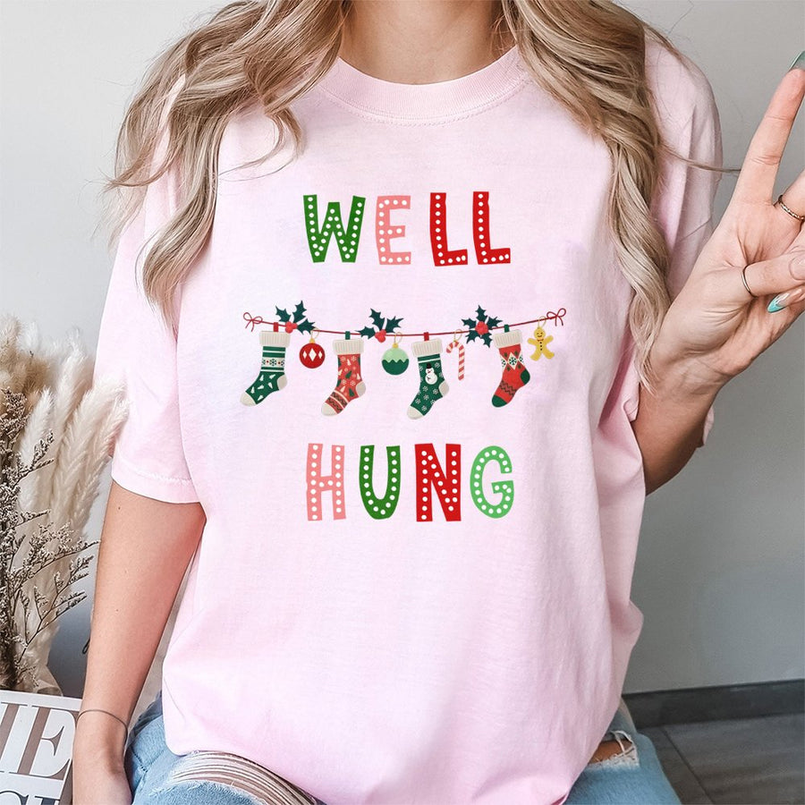 Well Hung Christmas T-Shirt | Funny Holiday Stocking Graphic | Premium 100% Cotton Tee | Naughty Gift for Couples & Dirty Santa Party