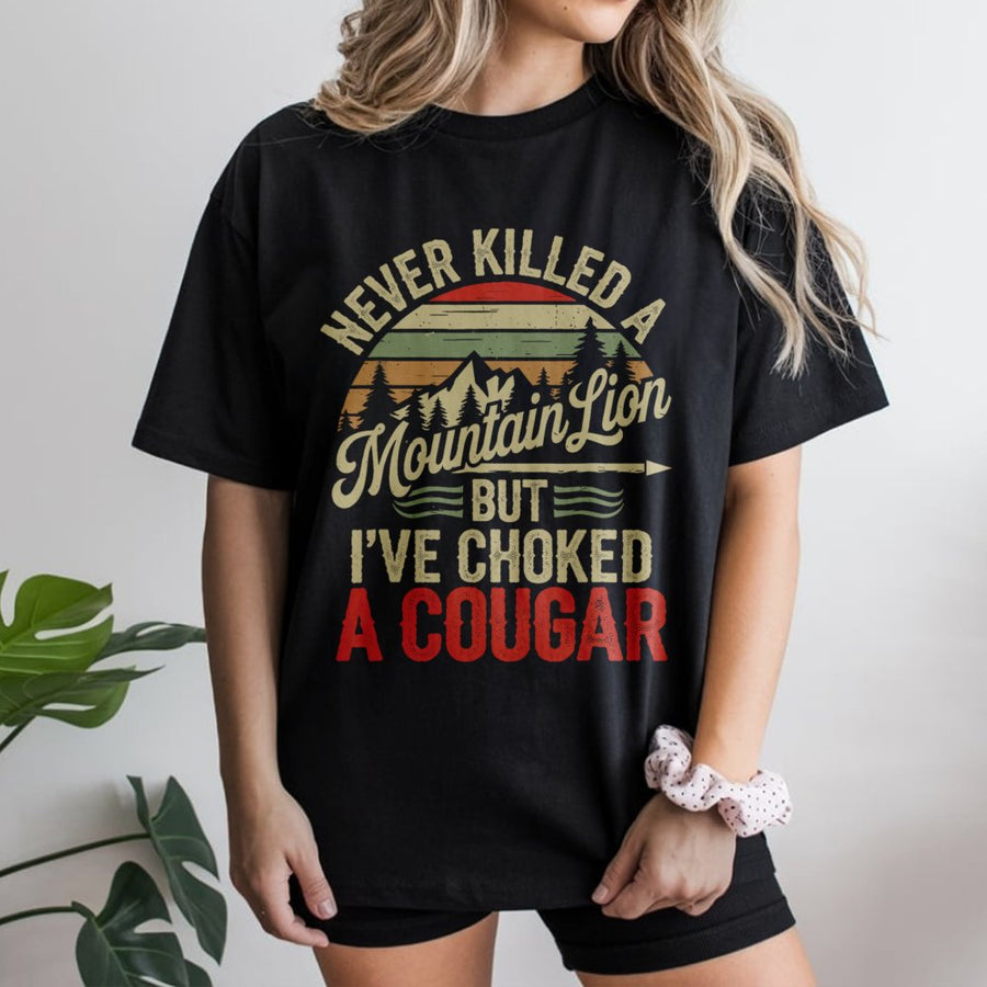 Never Killed A Mountain Lion But I've Choked A Cougar T-Shirt | Retro Outdoors Humor Graphic | Premium Cotton Unisex Tee | Funny Gag Gift For Him