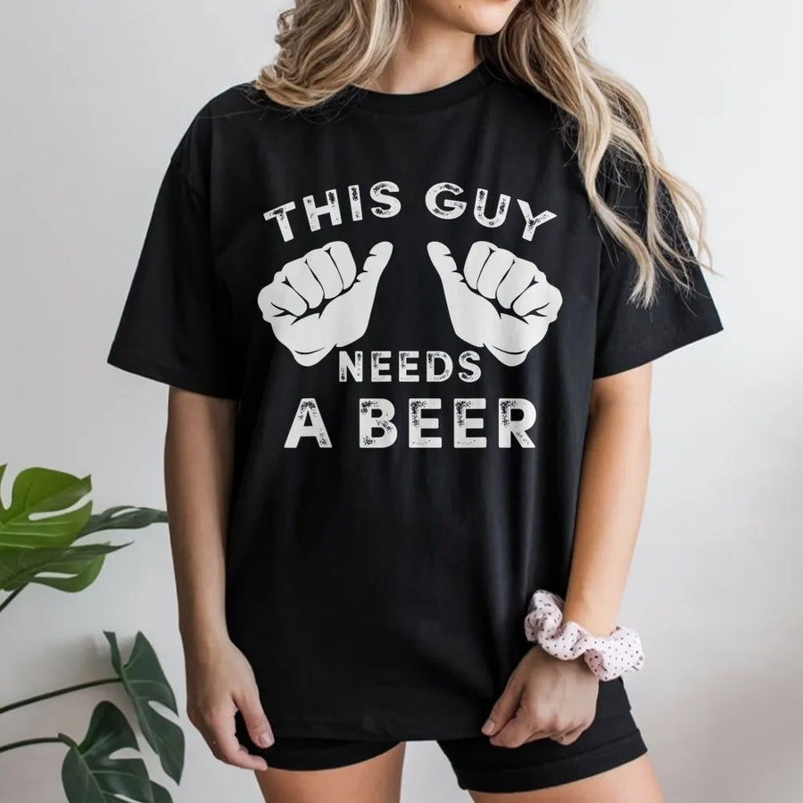 This Guy Needs A Beer T-Shirt | Funny Pointing Thumbs Graphic | Soft Cozy Pullover | Gag Gift for Husband, Dad, Beer Lover