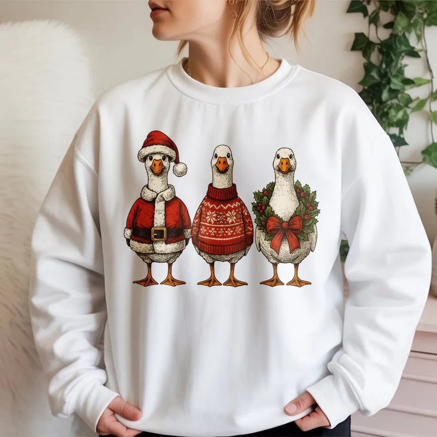 Christmas Goose Sweatshirt | Funny Santa Hat Holiday Trio Design | Premium Cotton Blend Unisex Crewneck | Cute Winter Apparel Gift For Animal Lovers