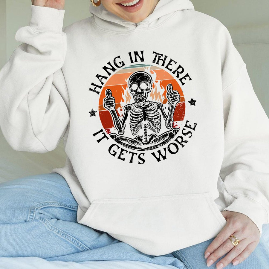 Hang In There It Gets Worse Skeleton Hoodie | Retro Sarcastic Graphic Pullover | Premium Cotton-Blend Comfort | Unisex Gift for Dark Humor Lovers