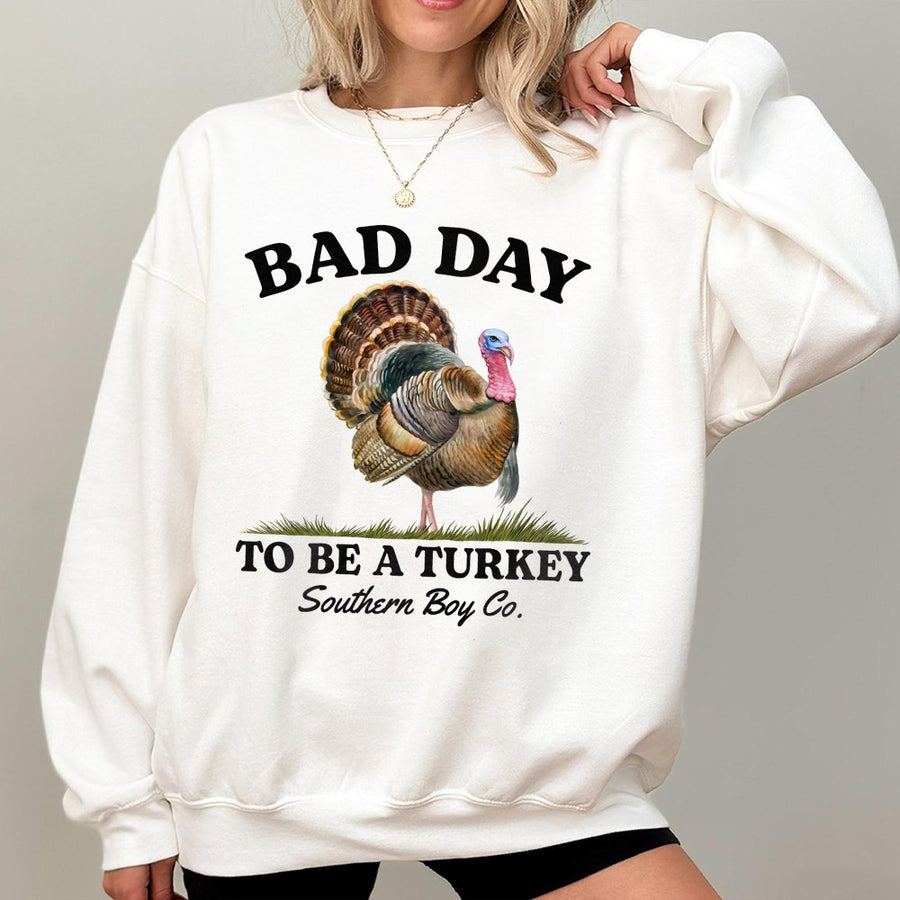Bad Day To Be A Turkey Sweatshirt | Funny Thanksgiving Graphic Tee | Premium Cotton Blend Crewneck | Unisex Holiday Humor Gift For Men Women