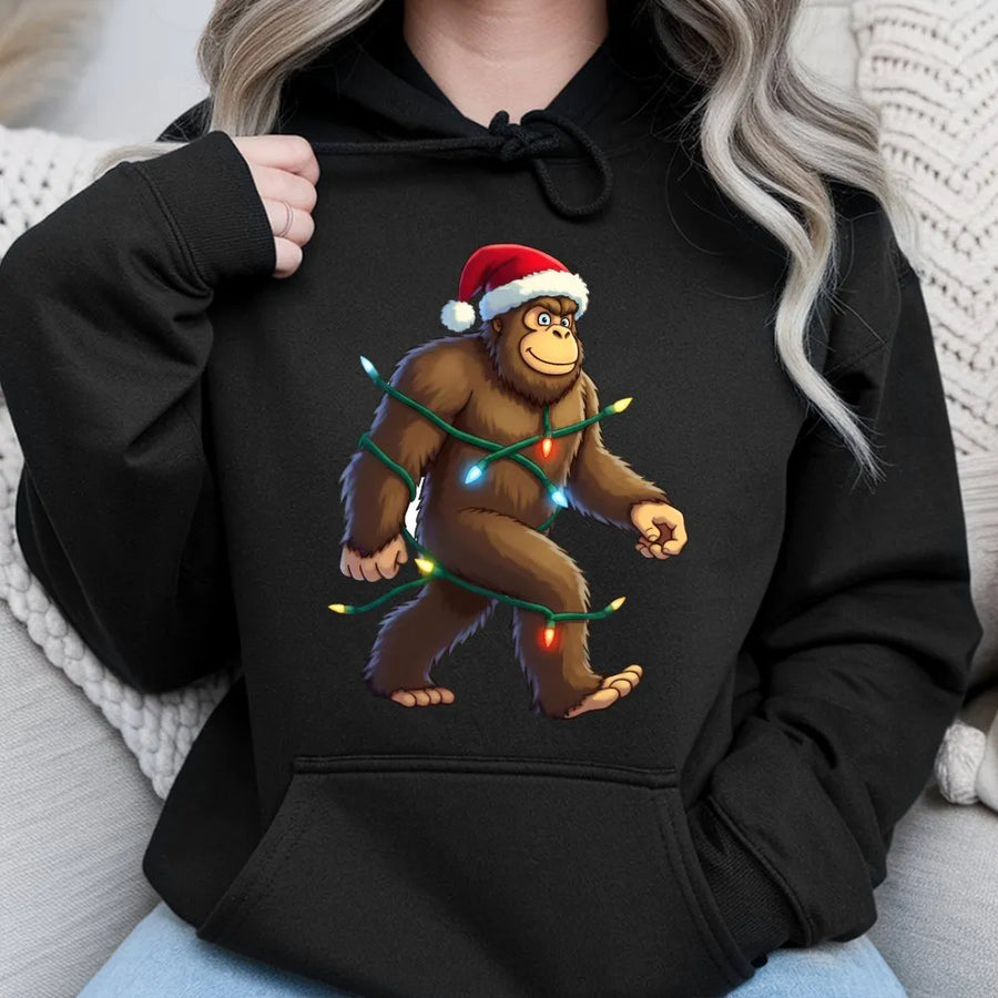 Bigfoot Christmas Lights Hoodie | Funny Sasquatch Santa Hat Graphic | Premium Cotton Blend Sweatshirt | Unique Holiday Gift For Men And Women