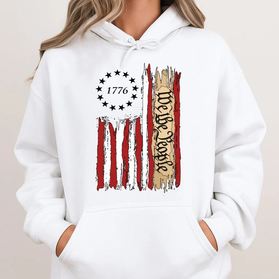 We The People 1776 Patriotic Hoodie | Distressed American Flag Graphic Design | Premium Cotton-Polyester Blend | Independence Day Gift For Him And Her